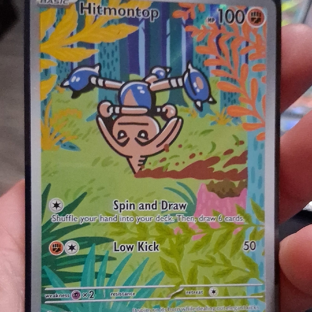 Pokemon Hitmontop Card - Blue, Green, Yellow, Orange, Pink